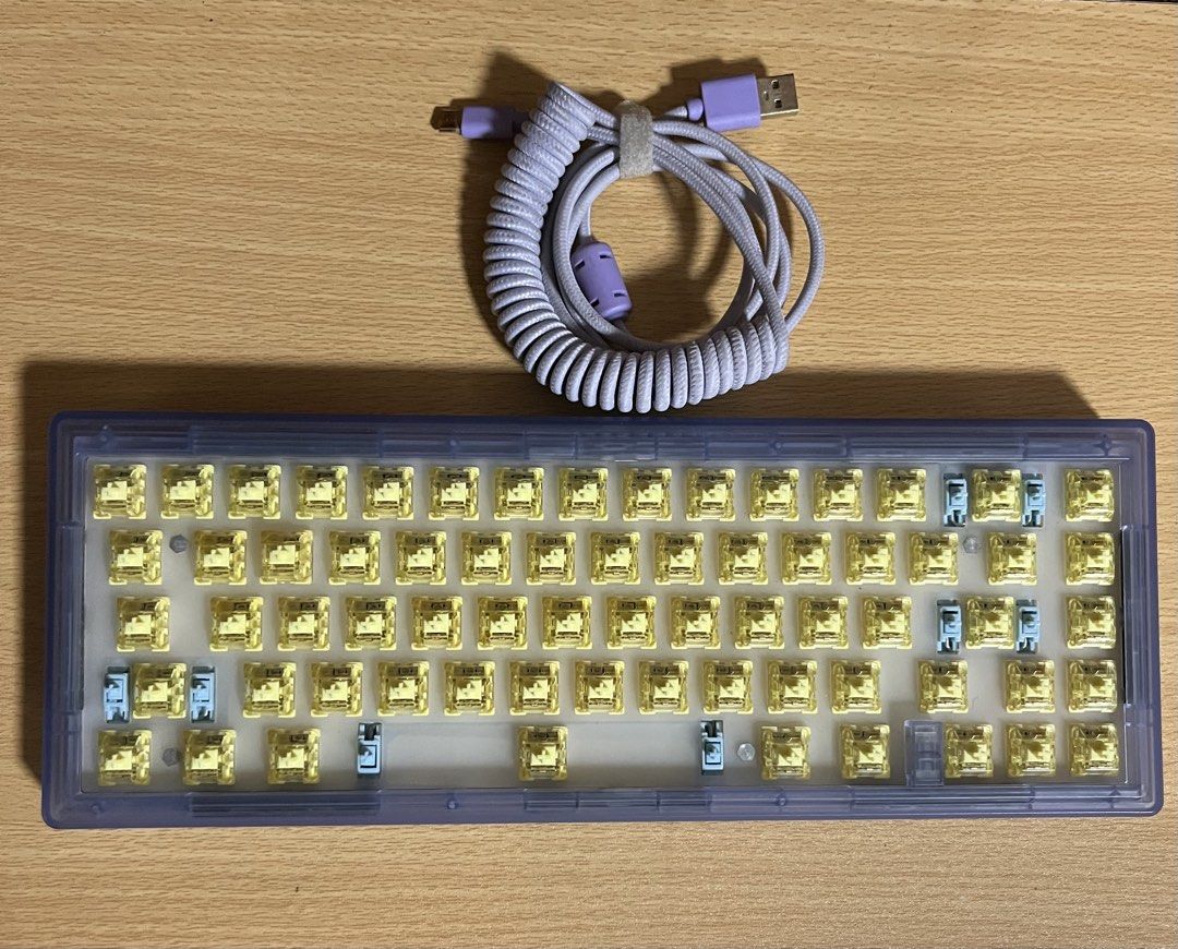 Customized Mechanical Keyboard (Category: Computer Keyboard) located in Makati City. Submitted by fraber_chie (Listing ID 1468720033, Image 3). Description: Php 1,999‼️ 🌻Hot Swap RGB Customized Transparent Mechanical Keyboard with purple coiled cable Brand : CIY Gas67 Switches : Akko V3 yellow No Swaps No issues - actual item posted 📍Location: Poblacion, Makati.