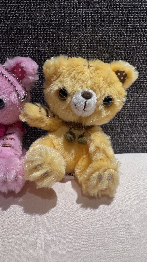 Cute Pink and Yellow Plush Bear Keychains Set (Category: Plushies & Soft Toys) located in Mandaluyong City. Submitted by maelovestoshop (Listing ID 1468871884, Image 3). Description: - Set of 2 adorable plush bear keychains (Pink & Yellow) - Pink bear features a cute bow necklace and polka dot ear lining - Yellow bear comes with a decorated collar with dangling charms - Super fluffy texture with embroidered paws and stitched cross details - Equip