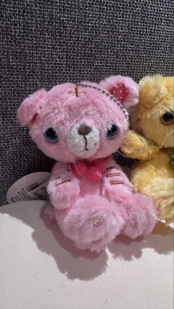 Cute Pink and Yellow Plush Bear Keychains Set (Category: Plushies & Soft Toys) located in Mandaluyong City. Submitted by maelovestoshop (Listing ID 1468871884, Image 2). Description: - Set of 2 adorable plush bear keychains (Pink & Yellow) - Pink bear features a cute bow necklace and polka dot ear lining - Yellow bear comes with a decorated collar with dangling charms - Super fluffy texture with embroidered paws and stitched cross details - Equip