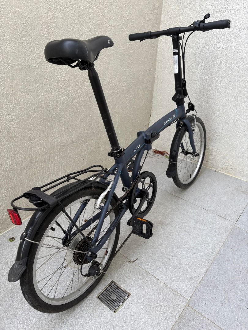 Dahon SUV D6 Folding Bicycle Matte Grey (Category: Bicycles) located in Mandaluyong City. Submitted by reginaldg0597 (Listing ID 1468769874, Image 2). Description: - Model: Dahon SUV D6 folding bike - Color: Matte dark grey - Speed: 6-speed drivetrain - Inclusions: Rear rack and fenders - Condition: Tyres, chain, and gears are all intact and ready to ride - Feature: Folds down smoothly for easy storage and public transport - Pick-up by schedule i