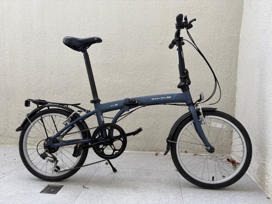 Dahon SUV D6 Folding Bicycle Matte Grey (Category: Bicycles) located in Mandaluyong City. Submitted by reginaldg0597 (Listing ID 1468769874, Image 1). Description: - Model: Dahon SUV D6 folding bike - Color: Matte dark grey - Speed: 6-speed drivetrain - Inclusions: Rear rack and fenders - Condition: Tyres, chain, and gears are all intact and ready to ride - Feature: Folds down smoothly for easy storage and public transport - Pick-up by schedule i