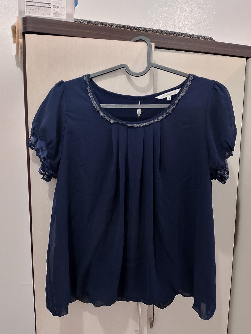 dark blue blouse (Category: Blouses) located in Imus. Submitted by hoshachoo (Listing ID 1468912377, Image 2). Description: tag: glacier, m bust: ~19 in length: ~20 in the bottom part is kinda bubbly! cant think of a better word to describe it xdxd pero ayun it makes it flowy when worn ganun gets ba ❤️‍🩹 dm for more deets sf to be shouldered by buyer no when worn preloved, pls manage your expectations ^__^.