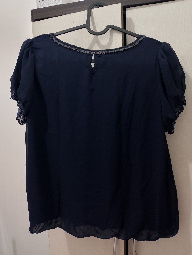dark blue blouse (Category: Blouses) located in Imus. Submitted by hoshachoo (Listing ID 1468912377, Image 3). Description: tag: glacier, m bust: ~19 in length: ~20 in the bottom part is kinda bubbly! cant think of a better word to describe it xdxd pero ayun it makes it flowy when worn ganun gets ba ❤️‍🩹 dm for more deets sf to be shouldered by buyer no when worn preloved, pls manage your expectations ^__^.