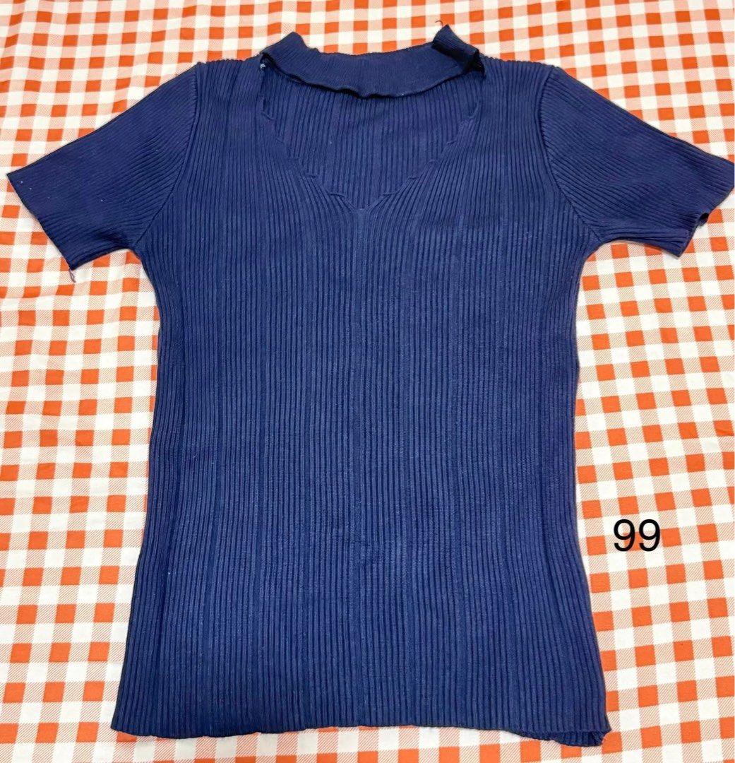Dark Blue Ribbed Short Sleeve Cold Shoulder Top (Category: Blouses) located in Quezon City. Submitted by itsmesummeeer (Listing ID 1468841176, Image 1). Description: - Color: Dark blue - Material: Stretchy ribbed knit - Details: Short sleeves, unique cutout neckline - Styling: Great basic piece to match with jeans or skirts - Size: L - 21”, W - 11-17”.