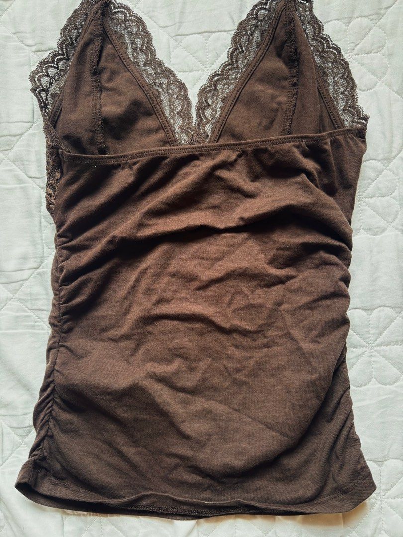 Dark Brown Lace backless top (Category: Sleeveless) located in Baguio. Submitted by michm (Listing ID 1468758496, Image 2). Description: Bought from Shein; no flaws; just washed, never worn Size XS on tag, best fit small to medium —— Please note that Colors may vary slightly due to lighting, photos, and screen settings. But I do my best to describe each item accurately. No returns, exchanges, or refunds. Shipping fee is shouldered by the buyer. T