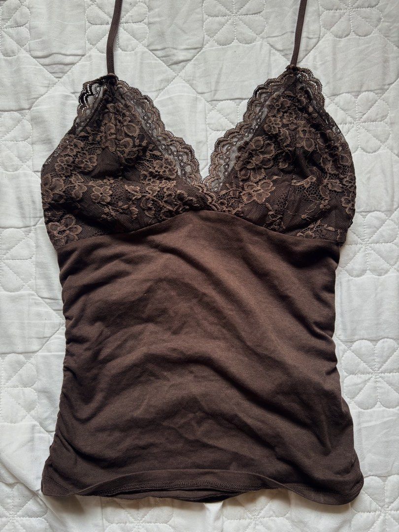Dark Brown Lace backless top (Category: Sleeveless) located in Baguio. Submitted by michm (Listing ID 1468758496, Image 1). Description: Bought from Shein; no flaws; just washed, never worn Size XS on tag, best fit small to medium —— Please note that Colors may vary slightly due to lighting, photos, and screen settings. But I do my best to describe each item accurately. No returns, exchanges, or refunds. Shipping fee is shouldered by the buyer. T