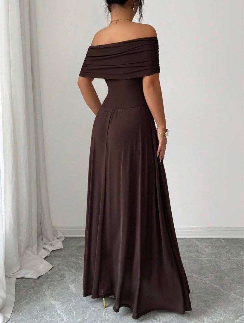 Dark Brown Off-Shoulder Draped Maxi Dress (Category: Dresses) located in Mandaluyong City. Submitted by rizmariecruz92152 (Listing ID 1468914498, Image 2). Description: - Color: Dark Brown - Style: Off-shoulder neckline with elegant draped overlay - Fit: Fitted bodice with a flowy maxi skirt and floor-length hem - Design: Simple pull-on style for effortless wear - Condition: Excellent, ready to wear for any occasion.