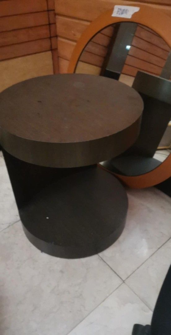 Dark Brown Oval Coffee Table (Category: Tables & Sets) located in Las Pinas. Submitted by jesus1smysavi0r (Listing ID 1468790870, Image 1). Description: - Color & Style: Dark brown with a simple minimalist design - Shape & Build: Thick oval top with four sturdy tapered wooden legs - Placement: Perfect for living rooms, bedrooms, or small lounge spaces - Condition: Solid build with minor signs of everyday use on the surface.