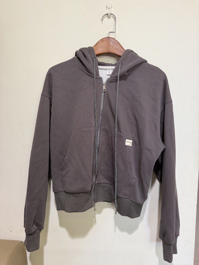 Dark Grey Zip-Up Hoodie with Front Pockets and Drawstrings (Category: Coats, Jackets and Outerwear) located in Baguio. Submitted by thelittolwardrobe (Listing ID 1468728257, Image 1). Description: S-M.