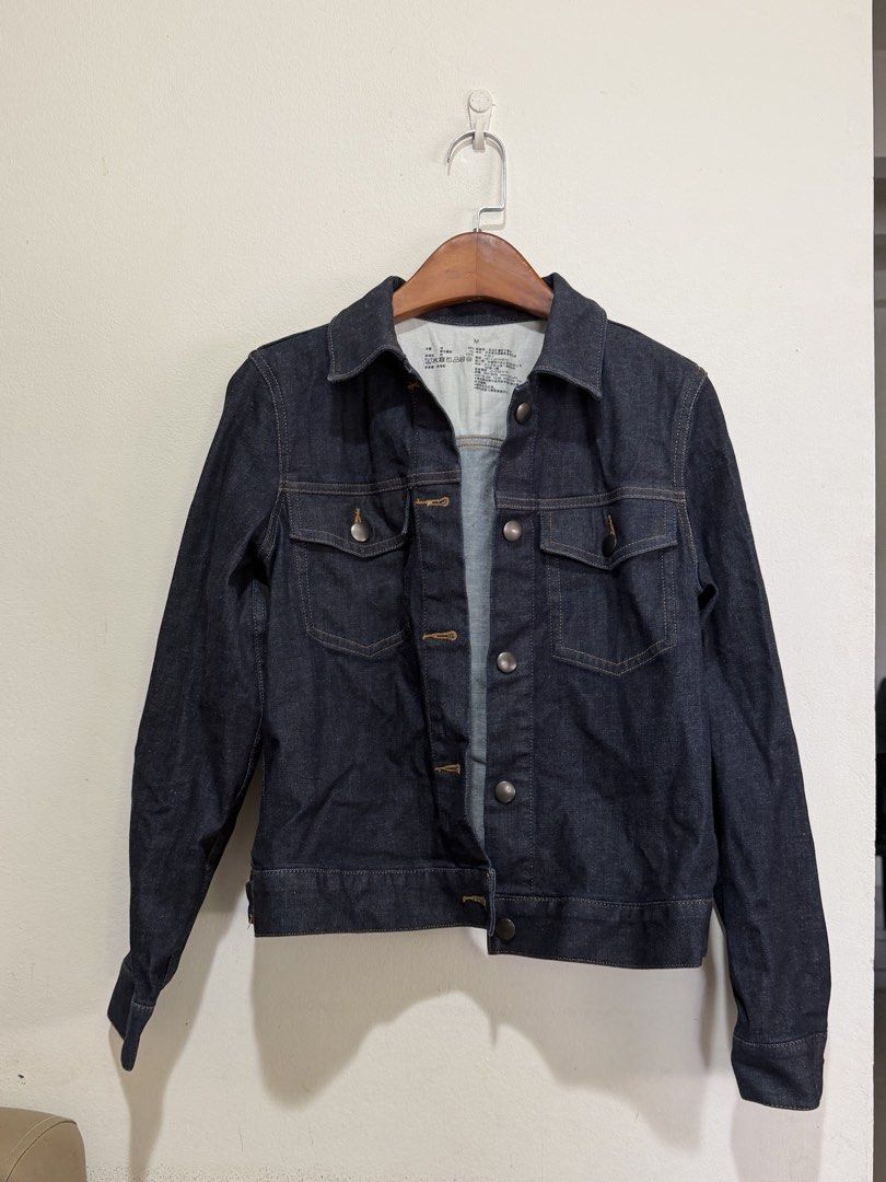 Dark wash denim jacket (Category: Coats, Jackets and Outerwear) located in Baguio. Submitted by thelittolwardrobe (Listing ID 1468757799, Image 1). Description: - Size: Xs-S - Color: Deep indigo dark wash (no fading) - Details: Classic button-up front, contrast stitching - Pockets: Two functional chest pockets - Sleeves: Long sleeves with button cuffs - Condition: Excellent, like new.