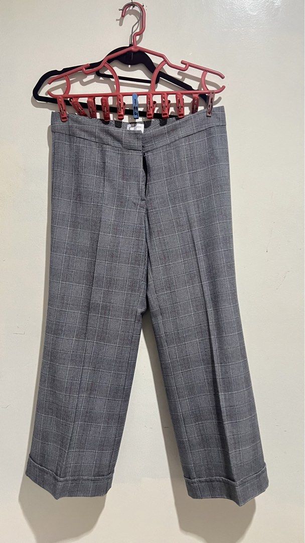 DC Classics Plaid Grey Trousers Pants Office (Category: Trousers) located in Cabuyao City. Submitted by calmstorm.0108 (Listing ID 1468835867, Image 1). Description: - Brand: DC Classics - Size: XL - Color/Pattern: Grey plaid with black, white, and subtle red grid lines - Fit: Wide leg cut with mid-rise waist - Details: Pleated front crease lines and cuffed hems - Closure: Front zipper - Condition: Excellent.