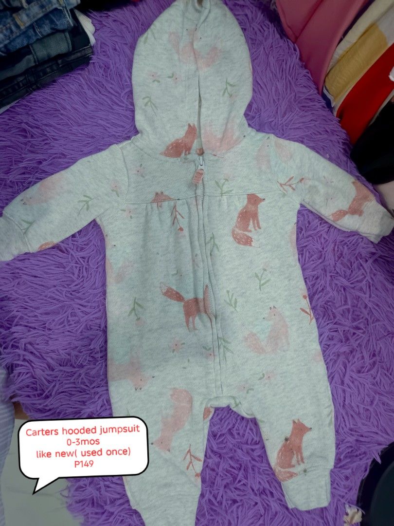 Decluttering kids clothes (Category: Babies & Kids Fashion) located in Manila. Submitted by cleverearth.ed94b6 (Listing ID 1468847393, Image 3). Description: - Brand: Breeze - Size: 6-9 months - Material: Soft fuzzy fleece - Design: Trendy grey leopard print - Features: Full zip front, two front pockets, dark grey ribbed cuffs and hem - Condition: Excellent/Warm and cozy layer for cold days.