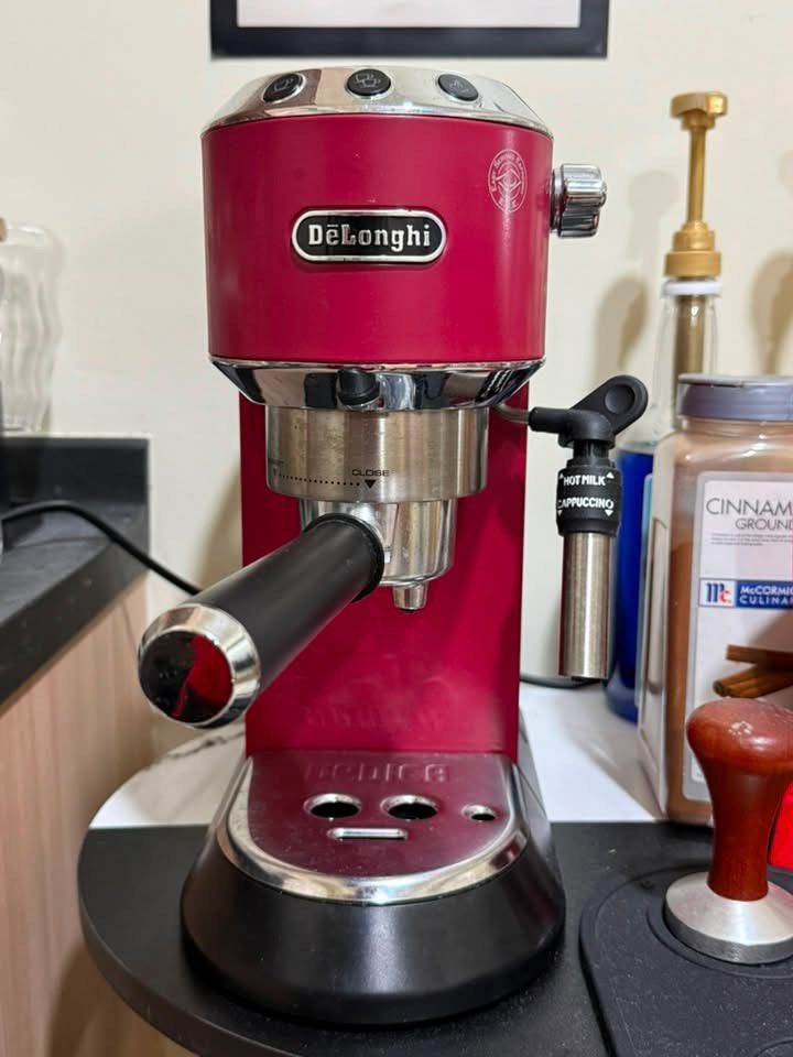 DeLonghi Dedica Manual Pump Espresso Machine Red (Category: Coffee Machines & Makers) located in San Juan City. Submitted by dsy764bbnd (Listing ID 1468754028, Image 2). Description: - Model: DeLonghi Dedica Espresso Maker in vibrant red - Compact footprint: Ideal for small kitchen counters and condo living - Milk Frothing: Side steam wand for delicious cappuccinos and lattes - Brew Options: Easy manual buttons for single shots, double shots, and