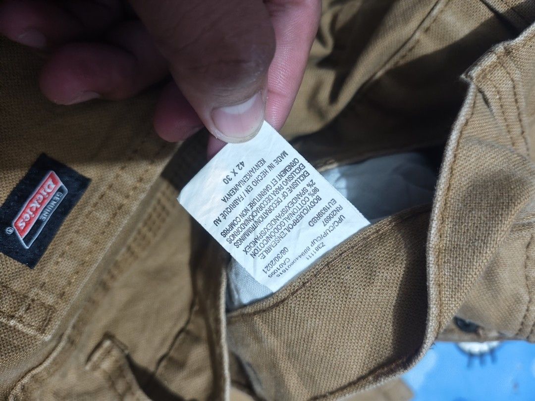 Dickies Brown Cargo Work Pants Size 42 (Category: Trousers) located in Manila. Submitted by joshespino71762 (Listing ID 1468908268, Image 2). Description: Brand/Model: Dickies brown utility work pants - Style: Classic carpenter style with multiple pockets and side tool pocket - Material: Tough, durable fabric built for daily wear or heavy-duty labor jobs - Measurements: Waist 42", Thigh 14.5", Length 42", Leg Opening 10" - Condition: Good, solid 