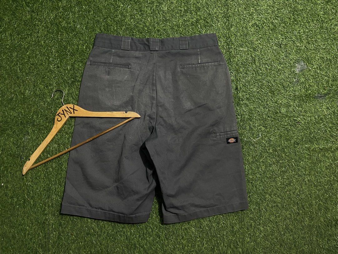 Dickies Loose Fit Grey Work Shorts (Category: Shorts) located in Las Pinas. Submitted by jynxdefant26140 (Listing ID 1468899779, Image 3). Description: - Brand: Dickies - Color: Grey - Style: Loose fit work shorts / Streetwear staple - Material: Sturdy and durable twill fabric - Pockets: Classic four-pocket design plus a functional left-leg tool pocket - Details: Branded Dickies logo patch on the back pocket and cool printed interior waistband li