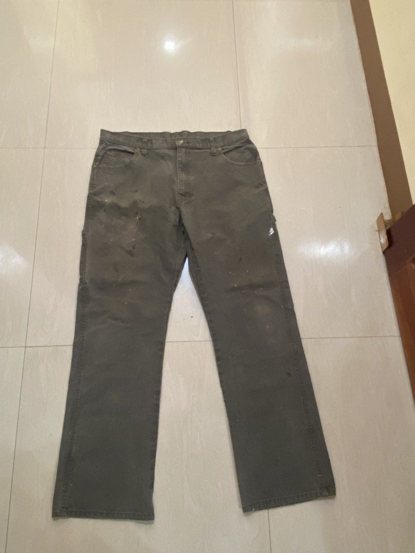 Dickies Painter Carpenter Pants Gray 36x32 (Category: Jeans) located in Vinzons. Submitted by gabrielvic (Listing ID 1468740281, Image 3). Description: - Brand: Dickies - Size: 36x32 - Color: Dark Gray - Material: Durable canvas - Fit: Regular fit workwear - Features: Side utility pockets and hammer loop - Condition: Authentic wear marks and paint splatters on the front and legs.