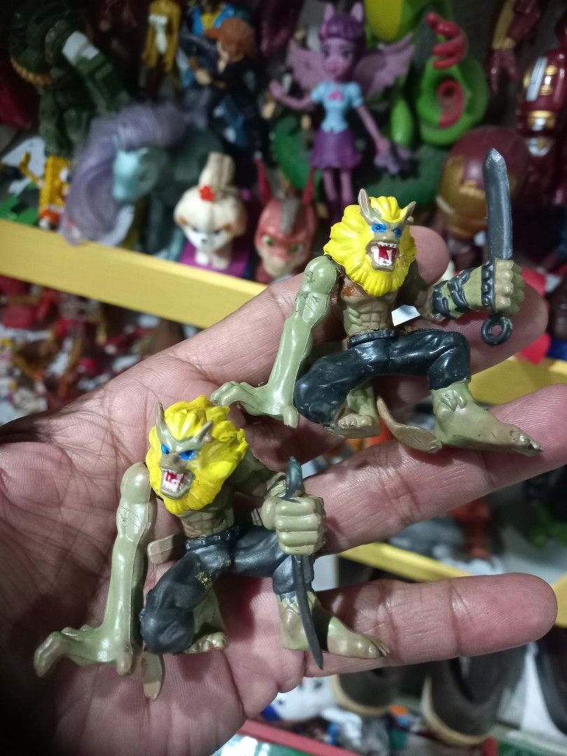 DIGIMON PALENGKE TOYS Monster Creature Warrior Action Figure Toy (Category: Figurines & Statues) located in Manila. Submitted by cristobalc40322 (Listing ID 1468810940, Image 2). Description: - Character: Green monster warrior with bright yellow hair and blue eyes - Outfit/Gear: Wearing black pants and holding a dark sword - Design: Detailed muscular sculpt with a barefoot stance - Usage: Cool collectible toy ideal for display or play VERY GOOD C