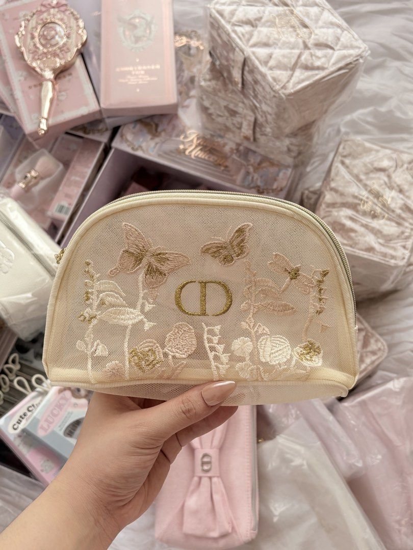 dior gwp embroidered pouch (Category: Purses & Pouches) located in Muntinlupa City. Submitted by pinkgurlyyy (Listing ID 1468740508, Image 1). Description: brand new authentic mop: gcash/maribank loc: muntinlupa shipping: J&T or lalamove (can ship today if lalamove!).