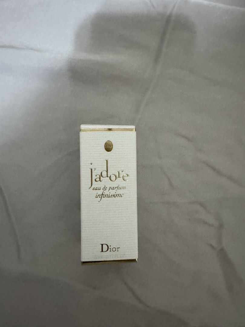 Dior J'adore Eau de Parfum Infinissime 5ml Mini (Category: Fragrance & Deodorants) located in Pasig City. Submitted by jubinnnie (Listing ID 1468726712, Image 1). Description: - Authentic Dior J'adore Eau de Parfum Infinissime - Size: 5ml / 0.17 fl oz (Miniature bottle) - Condition: Brand new, unused, and full (box only opened for photos) - Inclusions: Comes with original white and gold box - Perfect for travel, purse, or testing the fragrance be