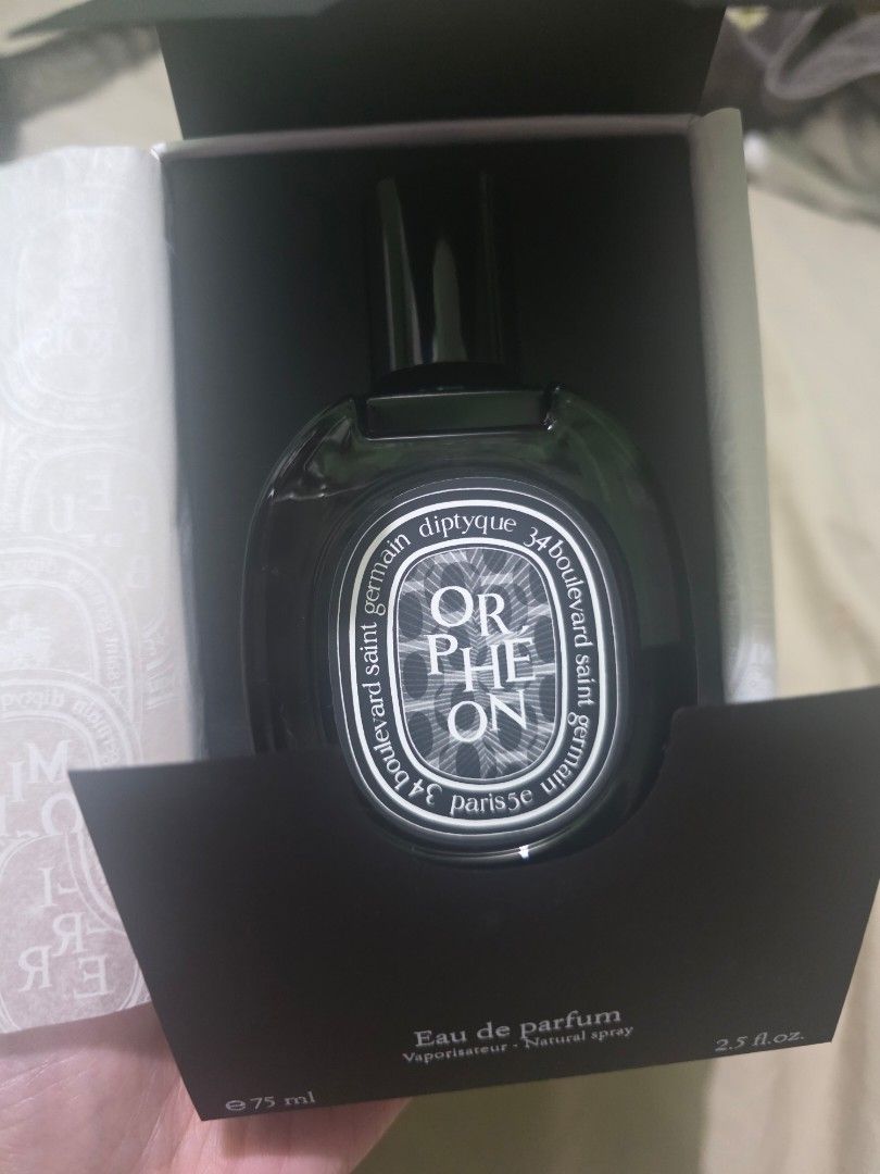 Diptyque Orphéon Eau de Parfum 75ml (Category: Fragrance & Deodorants) located in Taguig. Submitted by nekato (Listing ID 1468924149, Image 3). Description: - Brand: Diptyque - Fragrance: Orphéon Eau de Parfum - Size: 75ml - Condition: Brand new, factory sealed in original box - Source: Bought from My Hyundai Duty Free (proof of purchase / receipt available in screenshots) - Scent Profile: Amazing woody and floral notes - Availability: Ready to s