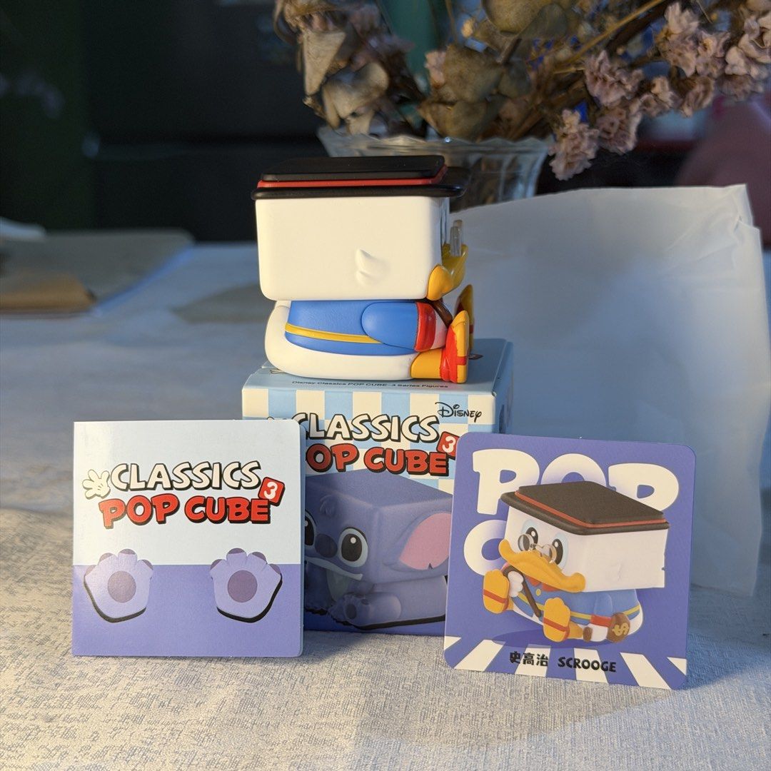 Disney Classics Pop Cube 3 Scrooge Figure (Category: Designer & Blind Box Toys) located in Guinobatan. Submitted by ktonkatsu (Listing ID 1468802722, Image 2). Description: 📍 BICOL Shipping via J&T - free sf - open box bottom - unboxed strictly to check design - complete inclusions w card, booklet, and original box.