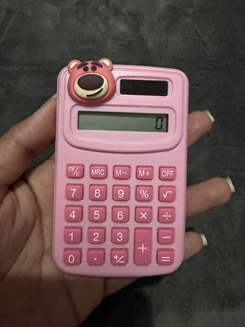 Disney Pixar Lotso Pink Mini Calculator (Category: Stationery & School Supplies) located in Mandaluyong City. Submitted by josa_xox0i8 (Listing ID 1468749711, Image 1). Description: Adorably designed Disney Pixar Lotso mini pocket calculator in pastel pink! Lightweight, compact, and super cute—ideal for students, office desks, or casual daily use. Design: Lotso Bear character detailing with soft pink buttons Features: 8-digit display, solar panel