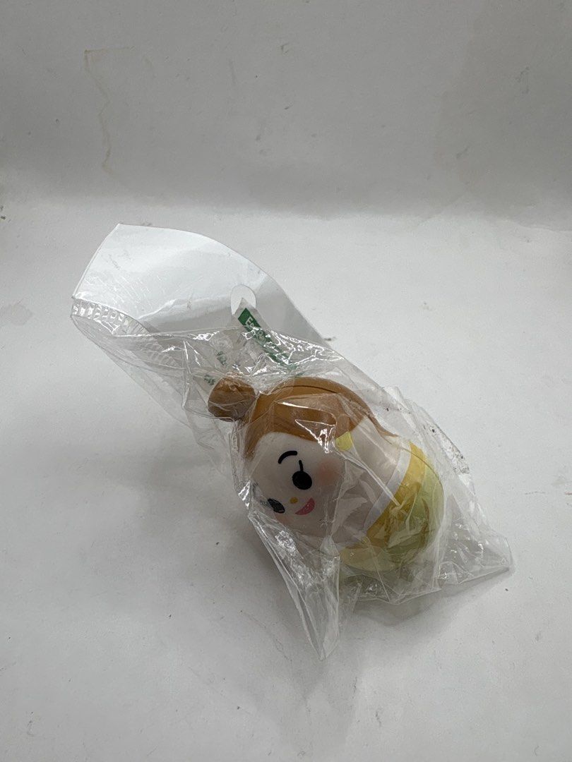 Disney Princess Belle Coonuts (Category: Designer & Blind Box Toys) located in Binan City. Submitted by treasurejoycollection (Listing ID 1468877026, Image 1). Description: - Condition: Brand new, factory sealed in original packaging with header card - Design: Cheerful expression, brown hair styled in a bun, and cute yellow clothing details - Base: Includes a stable round base style - Perfect for: Blind bag collectors, shelf displays, or as a sma