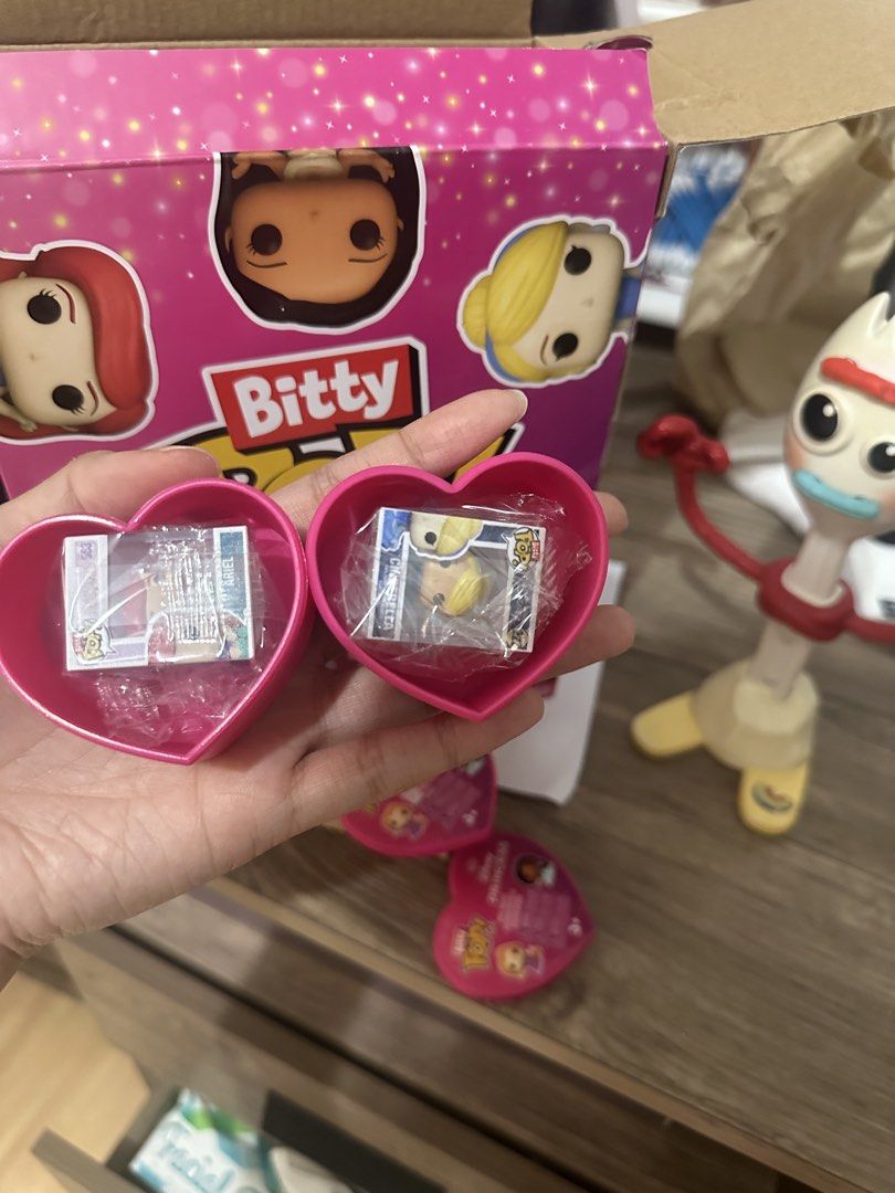 Disney Princess Bitty Pop! Ariel and Cinderella figures (Category: Designer & Blind Box Toys) located in Manila. Submitted by randomclothing (Listing ID 1468766883, Image 1). Description: - Includes 2 Disney Princess Bitty Pop! figures: Ariel and Cinderella - Comes in collectible pink heart cases - Brand new and 100% sealed in original mini boxes and plastic wrapping - Perfect addition to any Disney Funko Pop collection - Great for desk or shelf 