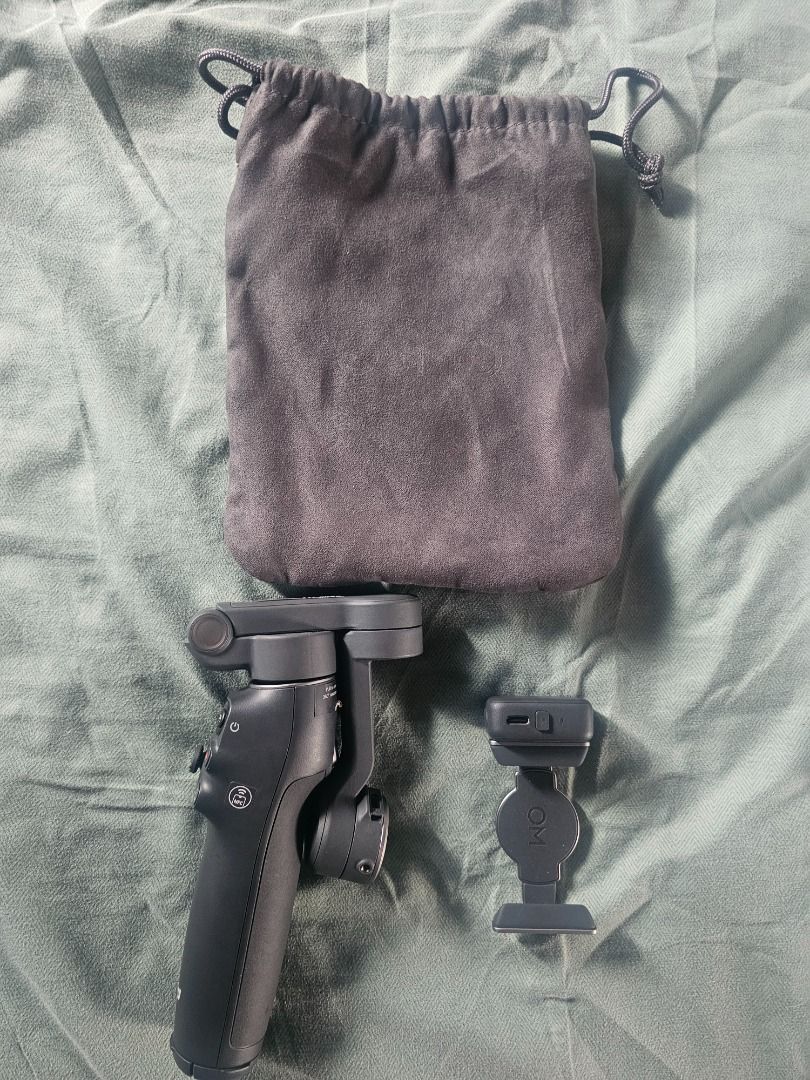 DJI Osmo Mobile 8 Smartphone Stabilizer (Category: Gimbals & Stabilizers ) located in Caloocan City. Submitted by marvilrey053617 (Listing ID 1468761784, Image 3). Description: - Item: DJI Osmo Mobile 8 Smartphone Stabilizer - Color: Classic Black - Design: Foldable & ultra-portable - Inclusions: Magnetic phone clamp & original retail box - Ideal for: Cinematic, shake-free phone videos and vlogs.