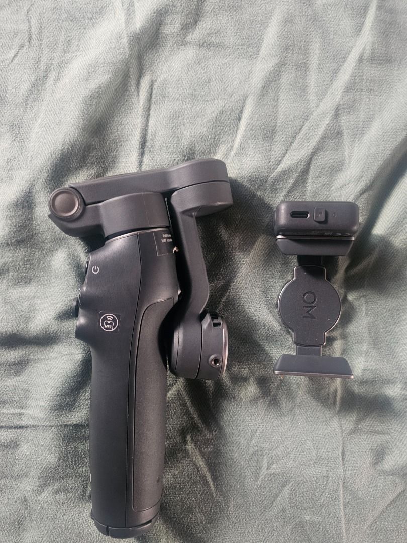 DJI Osmo Mobile 8 Smartphone Stabilizer (Category: Gimbals & Stabilizers ) located in Caloocan City. Submitted by marvilrey053617 (Listing ID 1468761784, Image 2). Description: - Item: DJI Osmo Mobile 8 Smartphone Stabilizer - Color: Classic Black - Design: Foldable & ultra-portable - Inclusions: Magnetic phone clamp & original retail box - Ideal for: Cinematic, shake-free phone videos and vlogs.