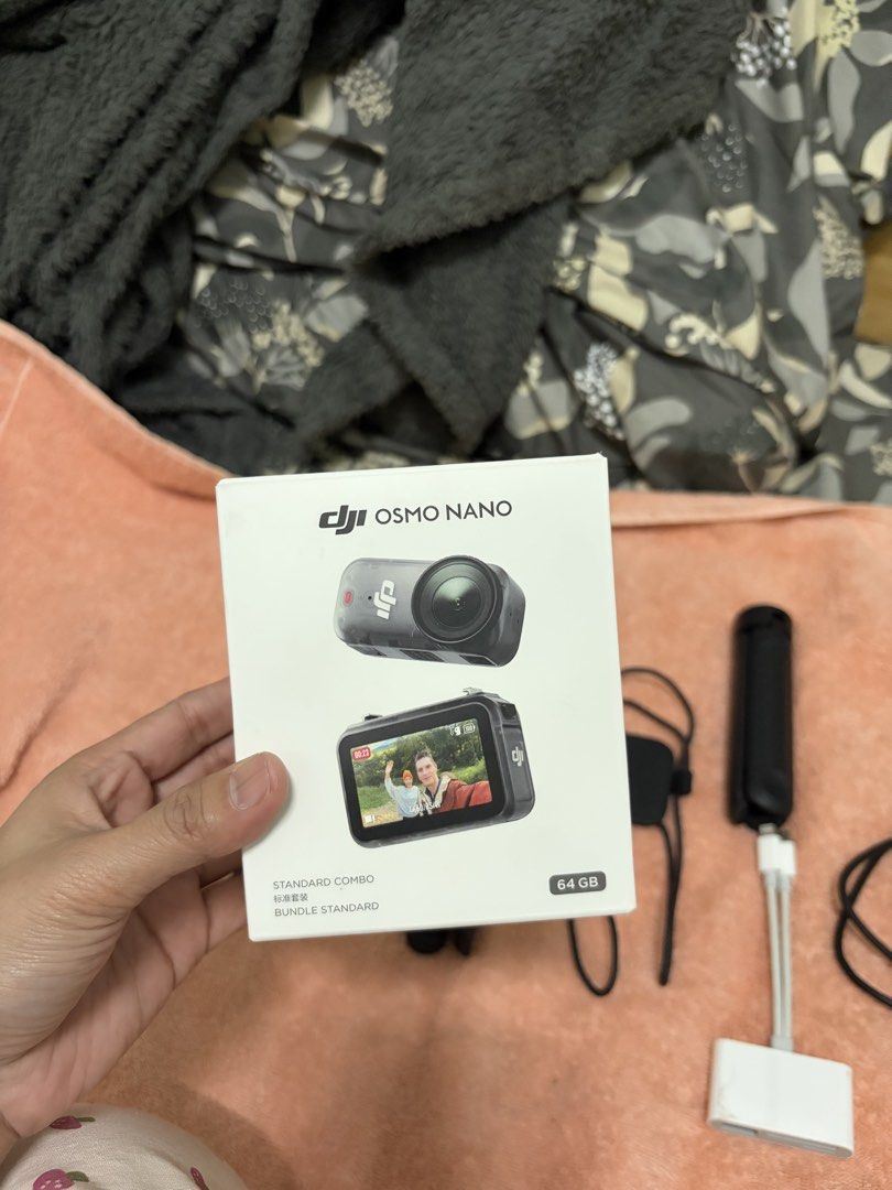 DJI OSMO NANO 64GB (Category: Cameras) located in Manila. Submitted by safeeagle_456c88 (Listing ID 1468817943, Image 2). Description: No issue Complete with box and all the accessories RFS: not using it anymore Freebies: Bash pouch Ulanzi Tripod 64 GB SD card and connector.