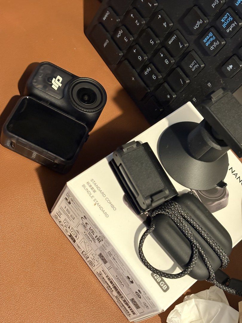 DJI Osmo Nano Action Camera (Category: Cameras) located in Antipolo. Submitted by pjpiii (Listing ID 1468778020, Image 3). Description: Selling newly bought osmo nano 128gb Activated October 17, 2026 only. Rfs: prefer cam with replaceable battery - DJI Osmo Nano action camera (Model: OsmoNano-3245) - Serial Number: 9LTXP5P00C57KW - Includes compact camera unit and screen module unit - App-ready with unbind option available in settings - Firmware 