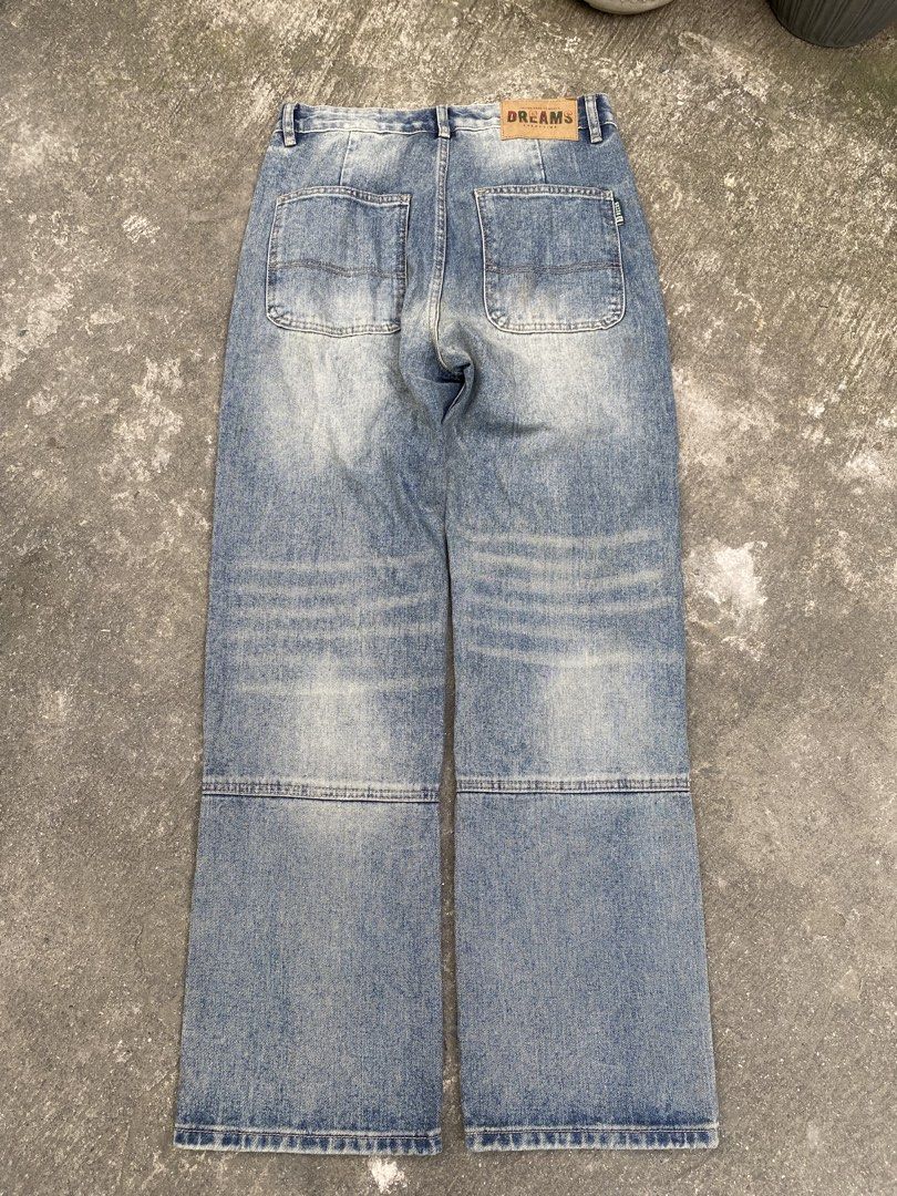 DOUBLE KNEE BNEW BAGGY PANTS (Category: Jeans) located in Abulug. Submitted by axeldot (Listing ID 1468803344, Image 2). Description: - Brand: DREAMS / 9 RECON - Size: 29 (tag still attached, unworn) - Color/Wash: Light blue wash with distressed fading front and back - Fit: Straight leg - Details: Multi-panel knee construction with contrast topstitching - Hardware: Premium YKK zippers and hardware - Branding: 9 RECON back tag and leather DREAMS w