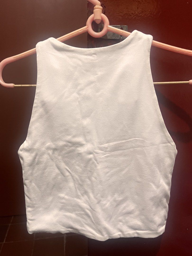 double lining tank top (Category: Sleeveless) located in Quezon City. Submitted by mademoisjelle (Listing ID 1468863252, Image 2). Description: comes with 2 tops alr gifted to me so i don't know what brand pero i know its from online shops.