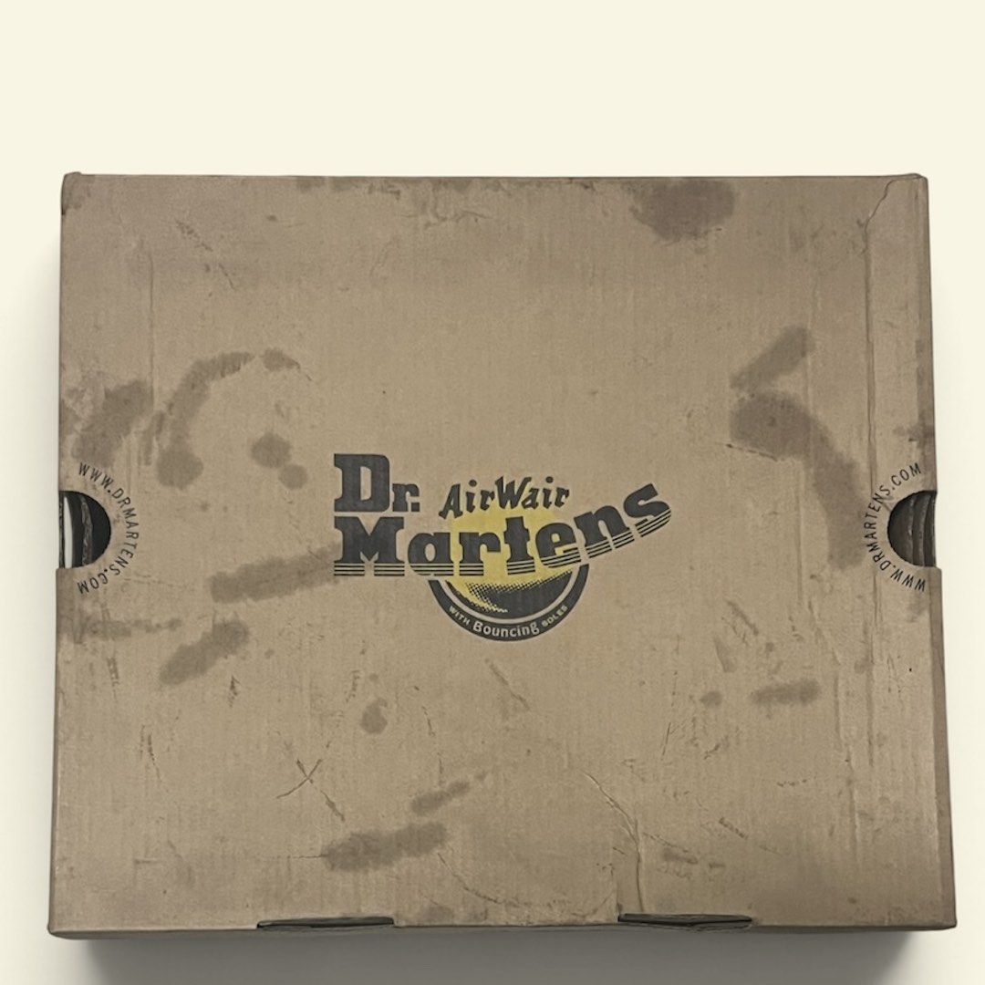 Dr. Martens 1460 Brown Leather Boots With Box (Category: Boots) located in Manila. Submitted by chococoffeeboy (Listing ID 1468888537, Image 3). Description: Dr. Martens 1460 - Tan/Dark Brown - Material: Leather - Classic 8-eyelet lace-up, iconic yellow welt stitching, bouncing soles tag - Condition: Lightly worn with minor creasing and scuffs; soles have plenty of life left -Replaced insoles - Inclusion: Original box with serial number Payment: 
