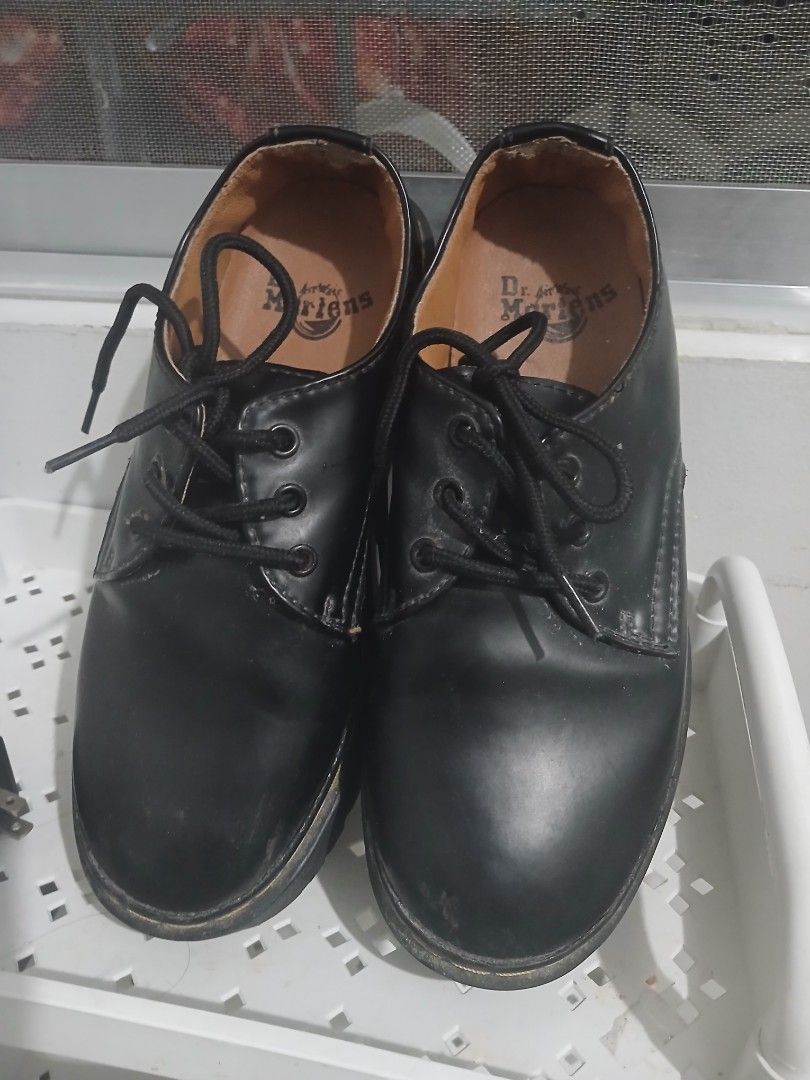 Dr. Martens Black Platform Derby Shoes (Category: Loafers) located in Quezon City. Submitted by bright.lenlen (Listing ID 1468836268, Image 3). Description: - Brand: Dr. Martens - Style: Black platform shoes with lace-up front and chunky lug sole - Details: Classic yellow welt stitching, leather upper, interior branding - Condition: Uppers are clean, soles show minor wear and dirt from previous use - Fit & Height: Solid platform height for an edg