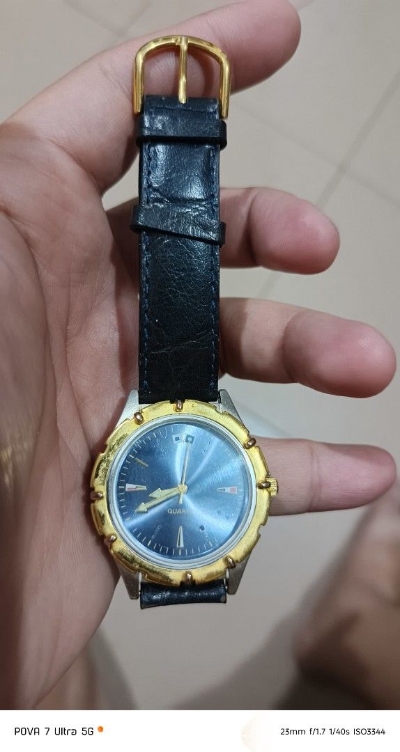 Dress Watch japan (Category: Women's Watches) located in Quezon City. Submitted by junseller18 (Listing ID 1468842832, Image 3). Description: newly replaced battery lr626 sept 2026. - Type: Japan Dress Watch - Movement: Quartz - Dial: Classic blue face with unique hour markers - Bezel: Gold-toned with decorative accents - Strap: Navy blue leather strap with buckle - Condition: 7/10 (pre-loved with minor signs of wear) - Ideal for casual or smart-