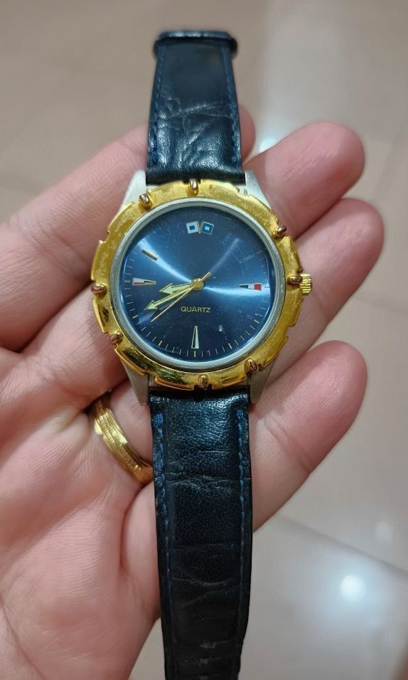 Dress Watch japan (Category: Women's Watches) located in Quezon City. Submitted by junseller18 (Listing ID 1468842832, Image 1). Description: newly replaced battery lr626 sept 2026. - Type: Japan Dress Watch - Movement: Quartz - Dial: Classic blue face with unique hour markers - Bezel: Gold-toned with decorative accents - Strap: Navy blue leather strap with buckle - Condition: 7/10 (pre-loved with minor signs of wear) - Ideal for casual or smart-