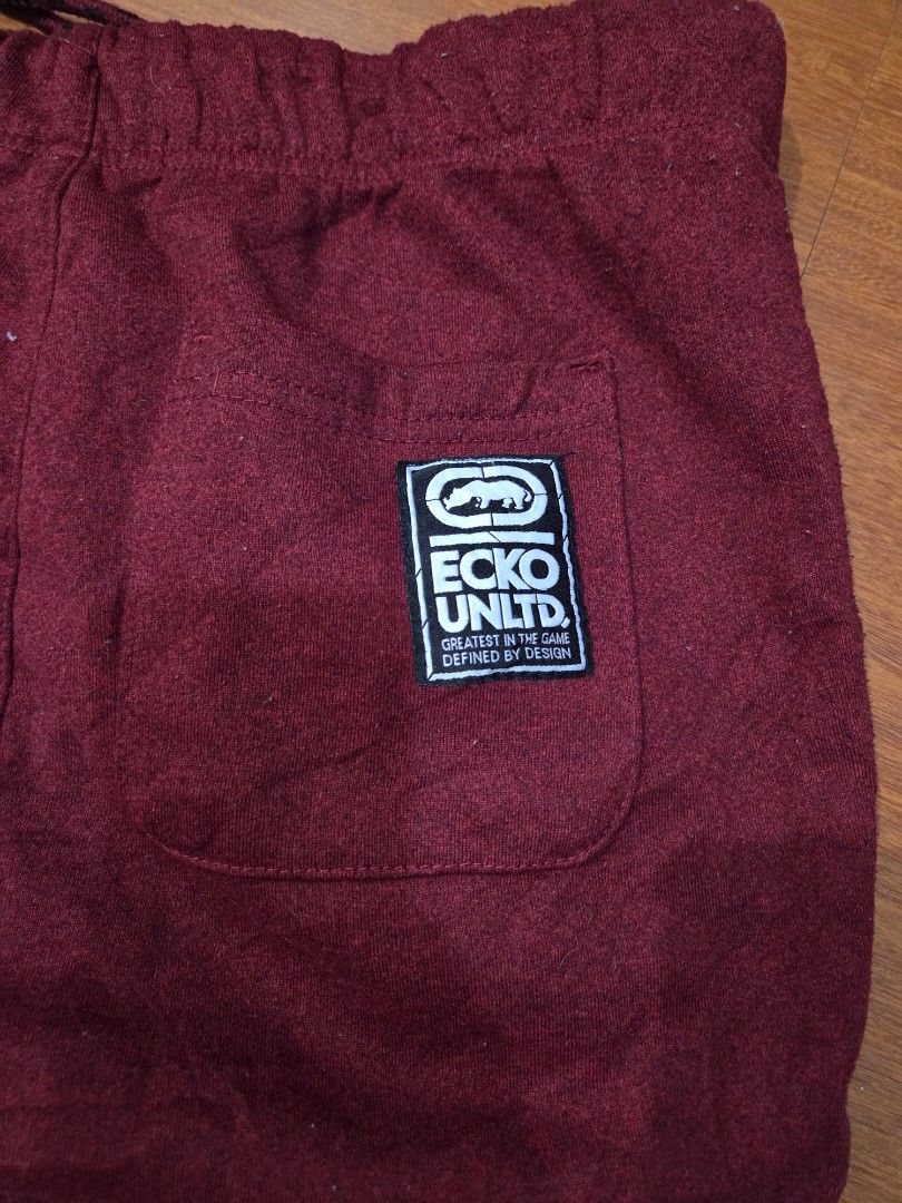 Ecko Unld. Maroon Sweatpants Size S (Category: Joggers) located in Taguig. Submitted by mon_143 (Listing ID 1468898583, Image 2). Description: - Brand: Ecko Unld - Color: Maroon - Size: Small fits up to large - Design: Large black graphic print on leg & back pocket patch - Features: Adjustable drawstring waist with branded metal tips & cuffed ankles - Material: Comfortable fabric, ideal for casual wear/loungewear.