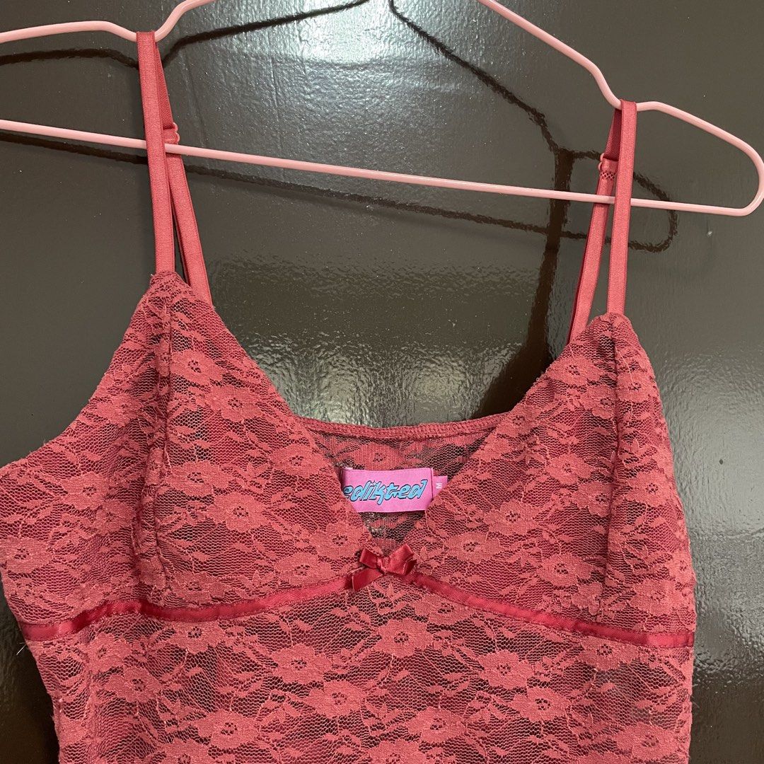 Edikted Pink Lace Cami Top Size M (Category: Sleeveless) located in Pasay City. Submitted by lovedbyzea (Listing ID 1468783956, Image 2). Description: - Brand: Edikted - Size: M - Color: Pink - Material: Soft and stretchy sheer floral lace - Features: Adjustable spaghetti straps and center front bow - Styling: Great for layering over a tee or wearing solo.