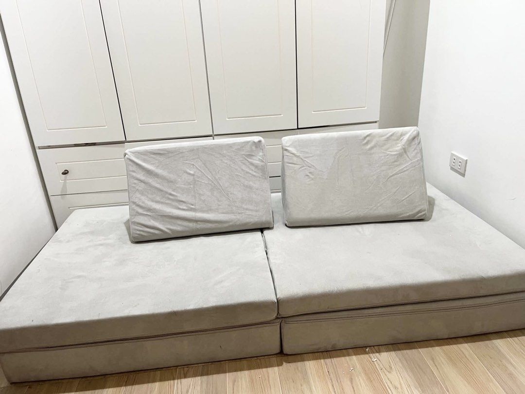 EducratePH TransformaCouch Play Couch (Category: Sofas) located in Pasig City. Submitted by ayaaramos (Listing ID 1468874862, Image 1). Description: - Brand: EducratePH modular play couch - Color/Material: Sleek grey microsuede with removable, machine-washable covers - Dimensions: 168cm x 84cm - Includes: Base cushions and two versatile triangular pillows - Features: Waterproof interior liners and high-resiliency CertiPUR foam inside - Perfect fo