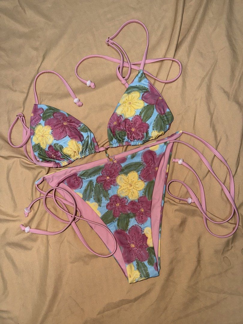 Eighth Mermaid Floral Beaded String Bikini Set Size S (Category: Bikinis & Swimsuits) located in Quezon City. Submitted by byebyetingz (Listing ID 1468756584, Image 1). Description: - Brand: Eighth Mermaid - Style: String bikini set with triangle top and side-tie bottoms - Print/Color: Blue, pink, and yellow floral print with intricate beaded flower detailing - Lining: Solid pink RFS: will repurchase in a different size. - Size: Small (S) with ta