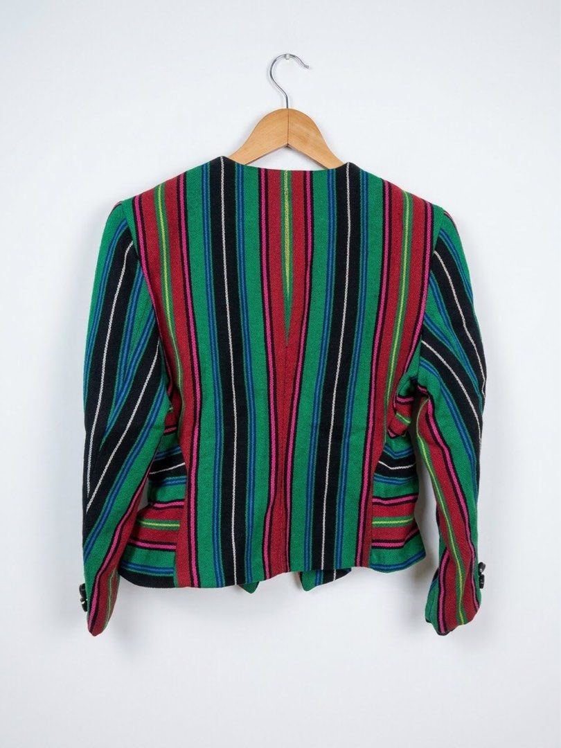 Emanuel Ungaro Christmas Stripes Blazer (Category: Coats, Jackets and Outerwear) located in Manila. Submitted by allymargret (Listing ID 1468800782, Image 2). Description: - Brand: Vintage Emanuel Ungaro - Size: 10/44 (Collar tag) - Design: Bold vertical stripes in green, red, black, pink, blue, and white - Details: Round neckline, black oversized statement buttons on front and cuffs, structured paneled construction - Material: Textured woven fab