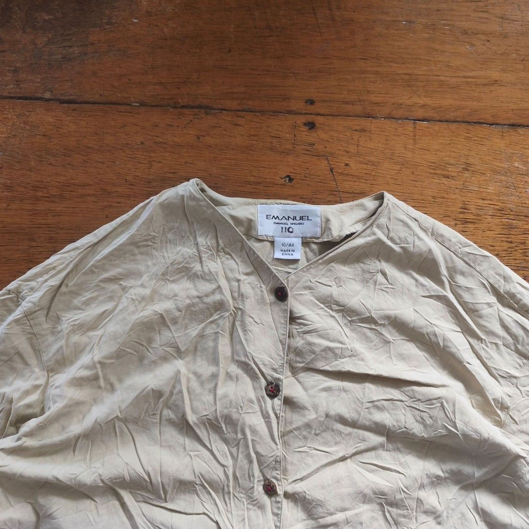Emanuel Ungaro silk Longsleeves (Category: Luxury Apparel) located in Tayabas. Submitted by cat.b0i (Listing ID 1468814757, Image 2). Description: Size on tag: 10/44 Fitting: Men - L Women - Semi XL ‎Length: 25.5 ‎Width: 21.5 ‎Shoulder: 20 ‎Arm Space: 8.5 ‎Sleeve Length: 20 ‎ ‎Color: Beige (item is more vibrant in actual) Color Rate: 9.2 ‎Material: 100% silk properties: ‎Issues: none ‎Condition: excellent.