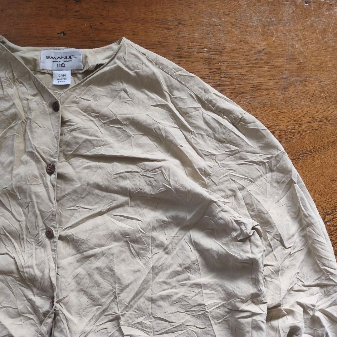 Emanuel Ungaro silk Longsleeves (Category: Luxury Apparel) located in Tayabas. Submitted by cat.b0i (Listing ID 1468814757, Image 3). Description: Size on tag: 10/44 Fitting: Men - L Women - Semi XL ‎Length: 25.5 ‎Width: 21.5 ‎Shoulder: 20 ‎Arm Space: 8.5 ‎Sleeve Length: 20 ‎ ‎Color: Beige (item is more vibrant in actual) Color Rate: 9.2 ‎Material: 100% silk properties: ‎Issues: none ‎Condition: excellent.