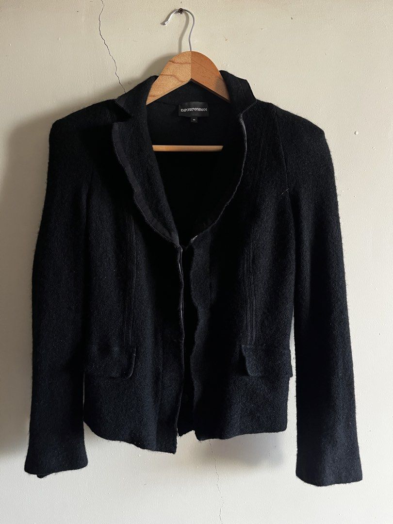 Emporio Armani Black Wool Jacket Size 46 (Category: Coats, Jackets and Outerwear) located in Bulacan. Submitted by handmedownfinds (Listing ID 1468718000, Image 1). Description: - Brand: Emporio Armani - Color: Black - Size: 46 (label inside collar) - Material: 100% Wool (shell), 100% Polyester (lining 2) - Design: Buttonless open front, structured paneling, ribbed detailing, and front flap pockets - Origin: Made in China - Condition: Excellent p