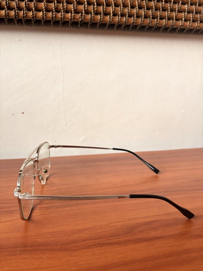 EO - Silver Aviator Eyeglasses Metal Frame - with Hard Case (Category: Sunglasses & Eyewear) located in Pasay City. Submitted by maxsell (Listing ID 1468787976, Image 2). Description: - Frame: Silver metal aviator with double bridge design - Lenses: Clear, prescription lenses (you can just go to EO and change to your prescription) - Details: Slim temples with comfortable black acetate ear tips - Fit: Adjustable nose pads for a custom fit - Style: