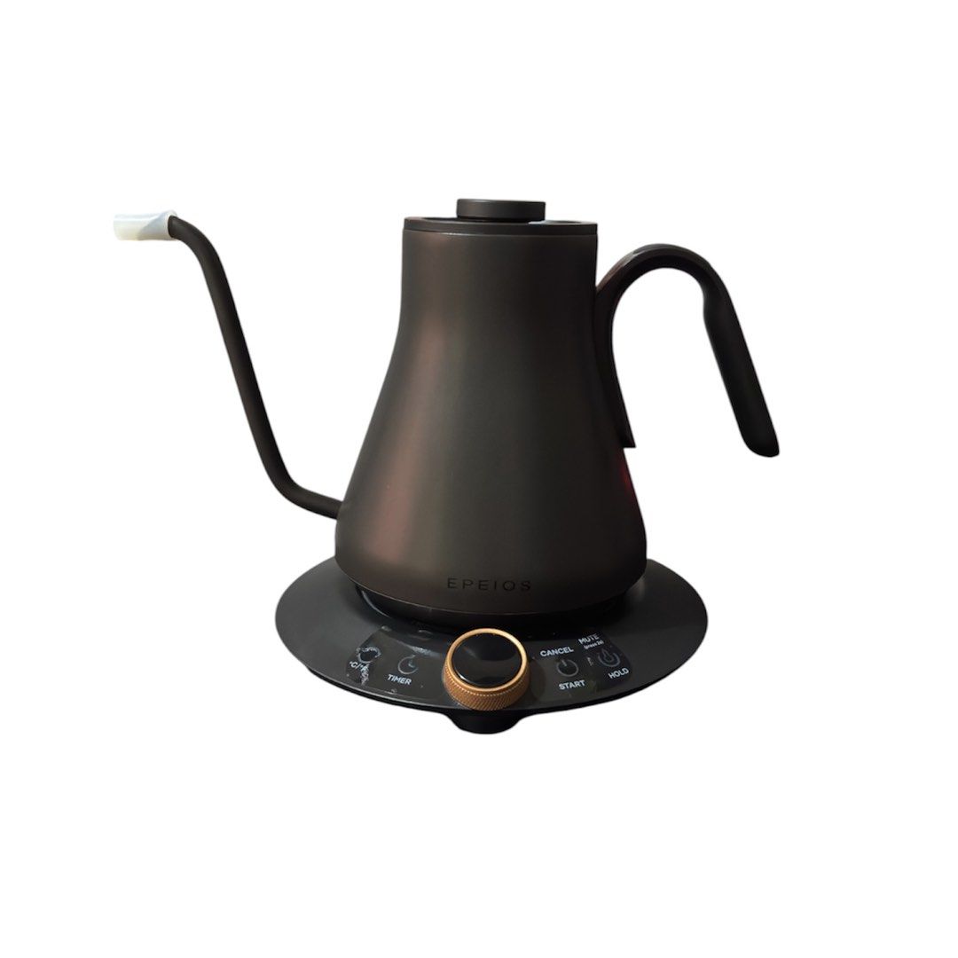100V Epeios Hummingbird Gooseneck Electric Kettle (Category: Coffee & Tea Tableware) located in Paranaque City. Submitted by dalle_closet (Listing ID 1468730222, Image 1). Description: 100v. slightly used pa ito Key Features • Design: Features a matte black finish, a long precision gooseneck drip spout, and a side-mounted ergonomic handle. • Base & Controls: Comes with a circular heating base equipped with a central copper-accented rotary dial an