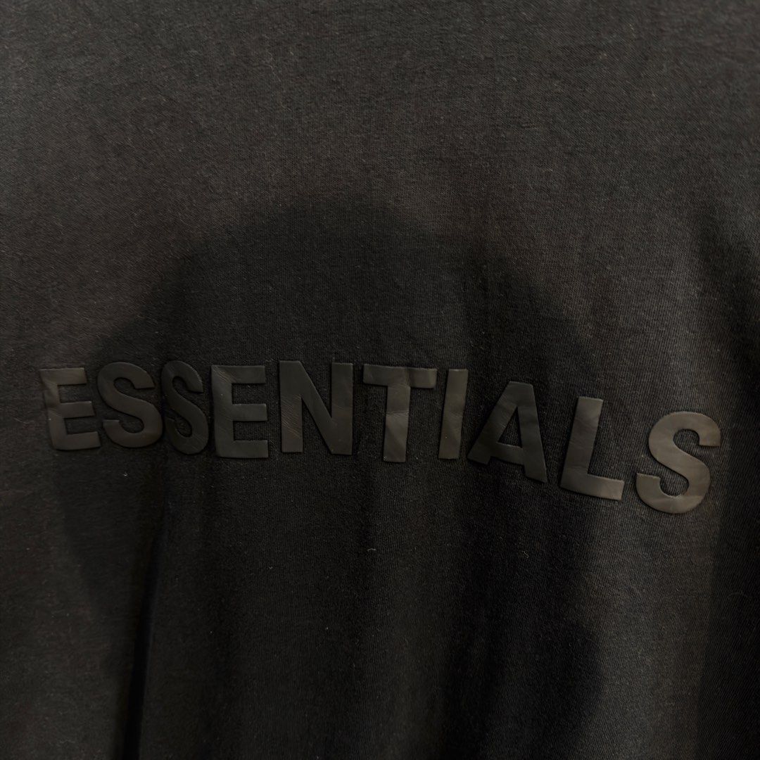 Essentials Black Mid Script Shirt (Category: Tshirts & Polo Shirts ) located in Manila. Submitted by jerichomal82553 (Listing ID 1468899080, Image 3). Description: Essentials Black Mid Script Shirt 22 by 29.5 Good Condition Complete Tags CLAIM 1300.