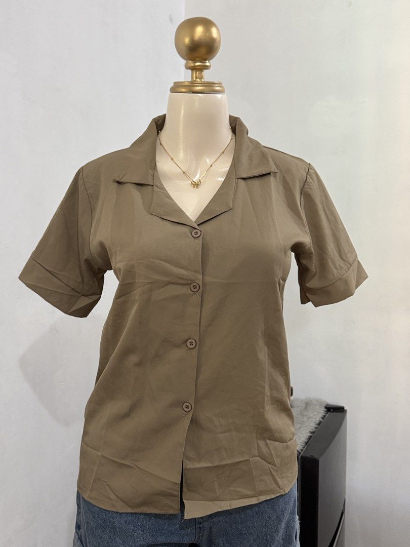 ETC LIGHT BROWN POLO BLOUSE (Category: Blouses) located in Dasmarinas. Submitted by ennahsthriftcollection (Listing ID 1468733495, Image 3). Description: ETC LIGHT BROWN POLO BLOUSE MEDIUM ON TAG new unused Width : 18 1/2 inches Length : 24 inches.